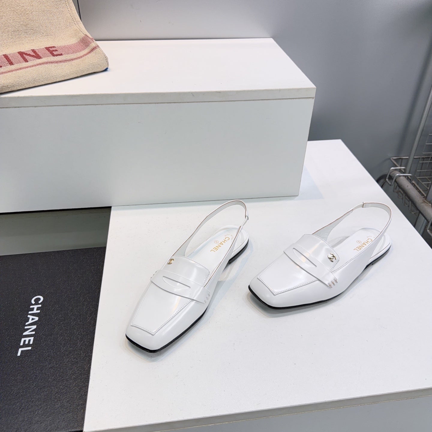 CHANEL 26S SLINGBACK FLATS IN WHITE PATENT LAMBSKIN