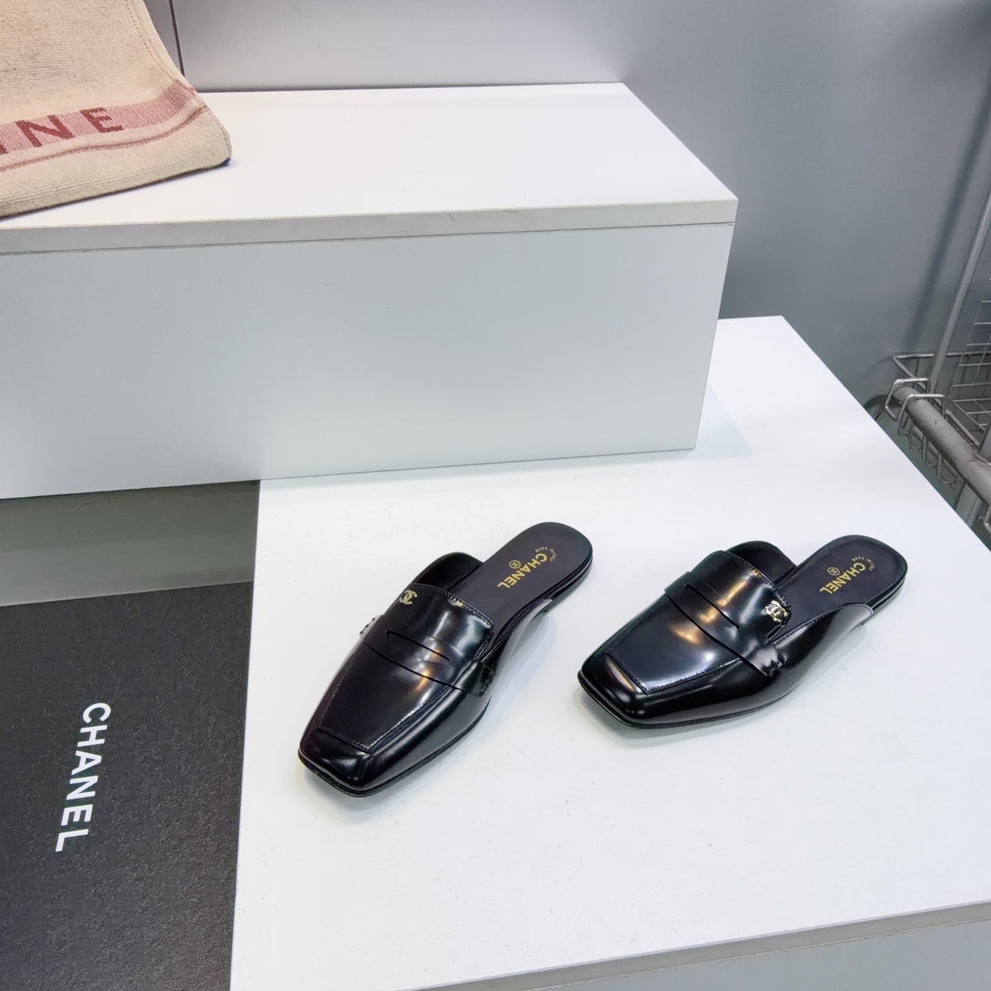 CHANEL 26S LOAFER MULES IN BLACK PATENT LAMBSKIN