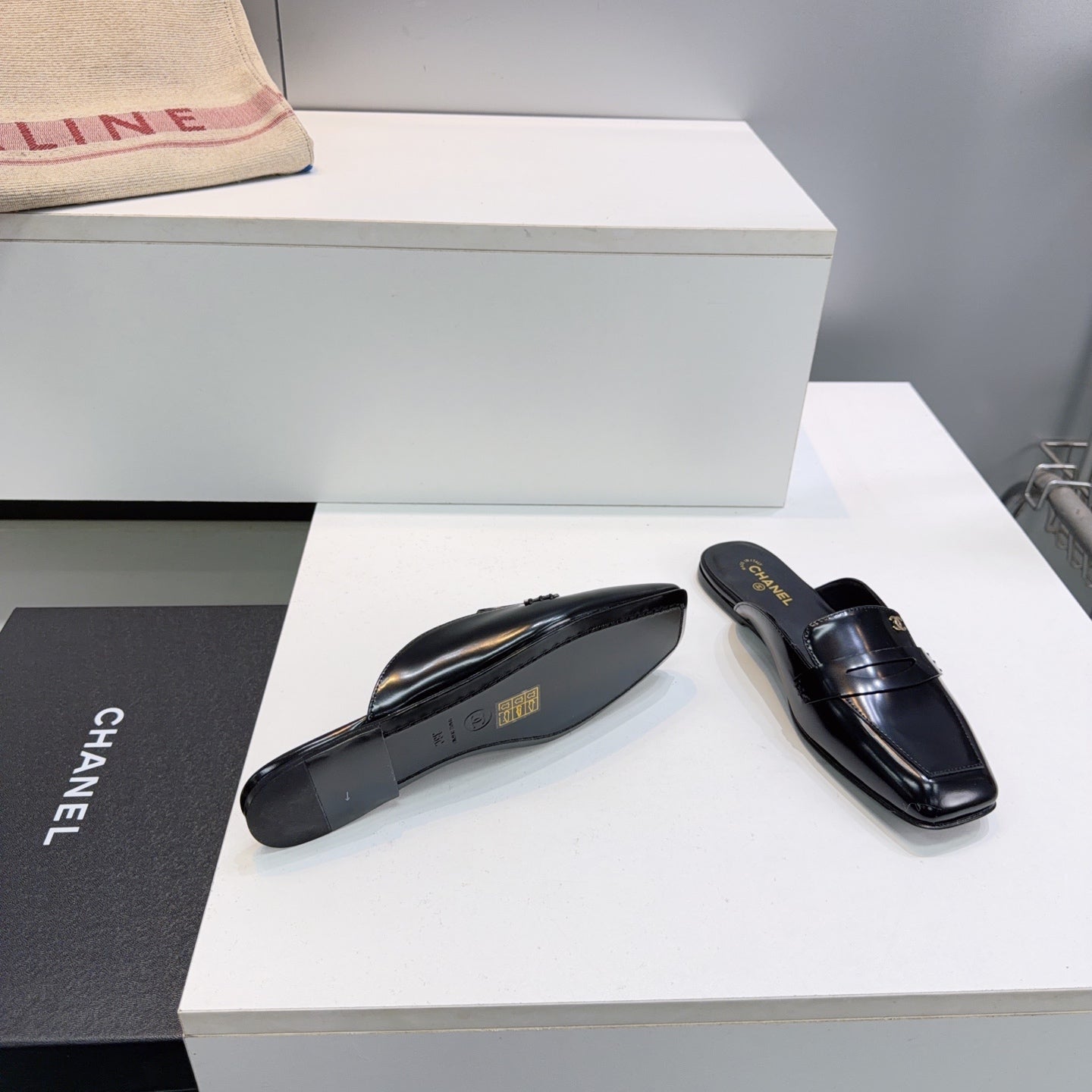 CHANEL 26S LOAFER MULES IN BLACK PATENT LAMBSKIN