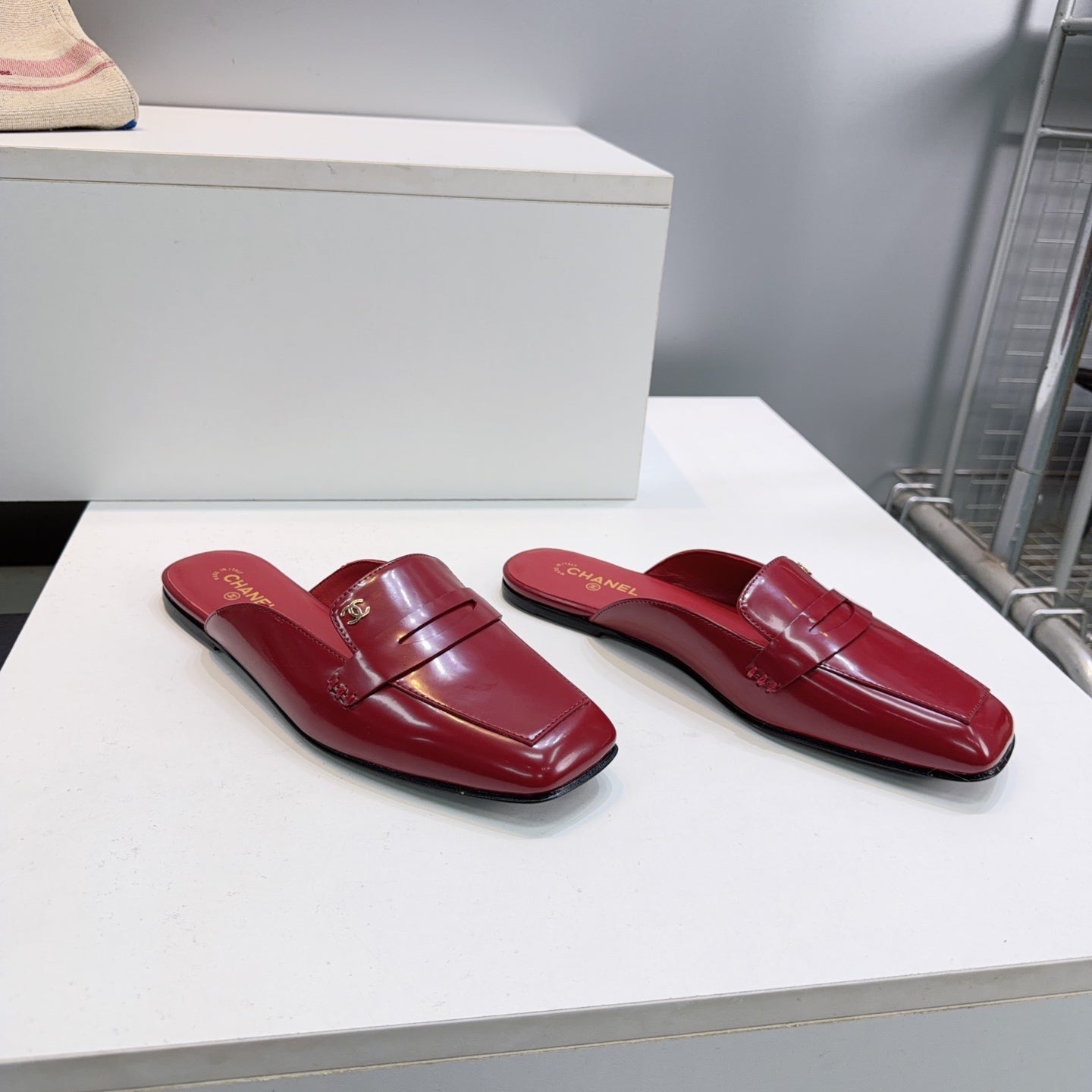 CHANEL 26S LOAFER MULES IN BURGUNDY PATENT LAMBSKIN