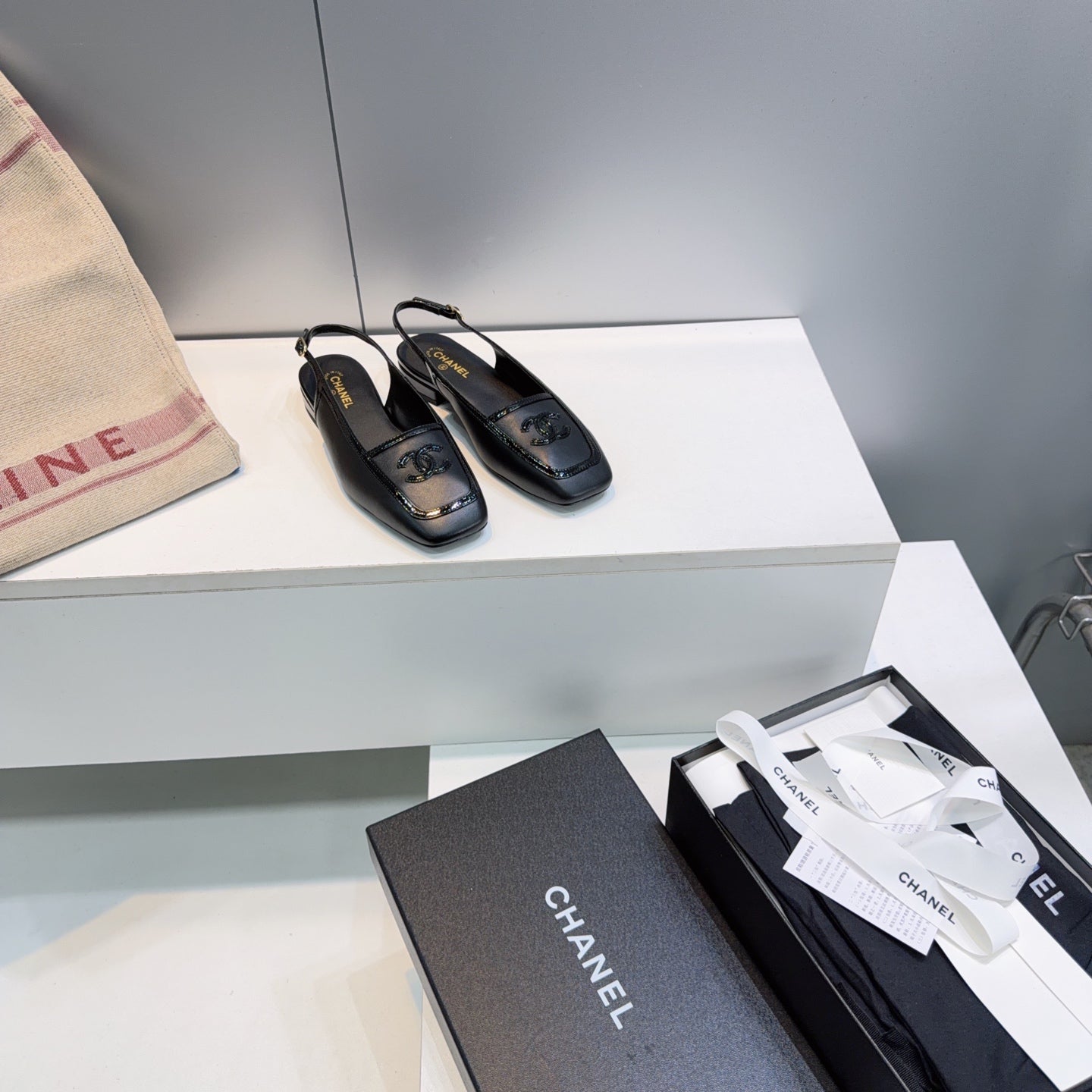 CHANEL 26S SLINGBACK FLATS IN BLACK CALFSKIN WITH PATENT