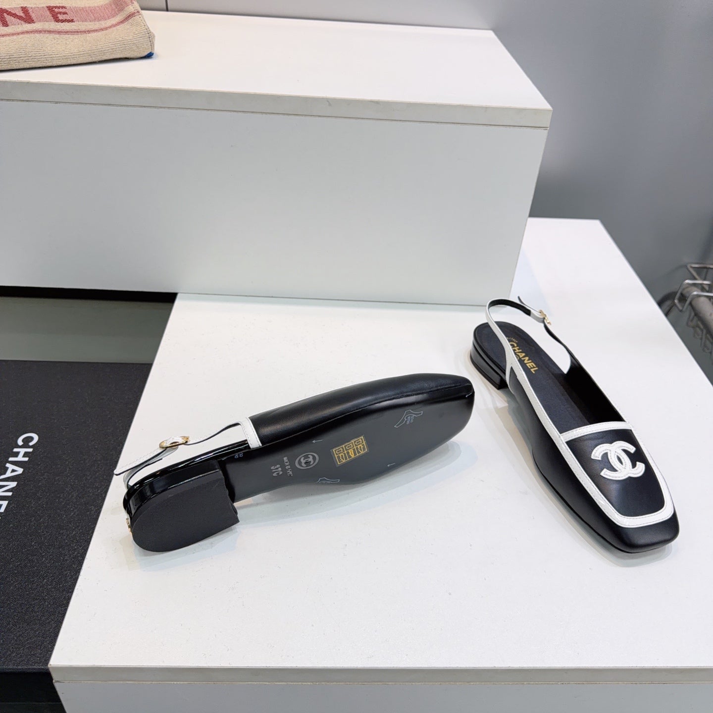 CHANEL 26S SLINGBACK FLATS IN BLACK CALFSKIN WITH WHITE PATENT