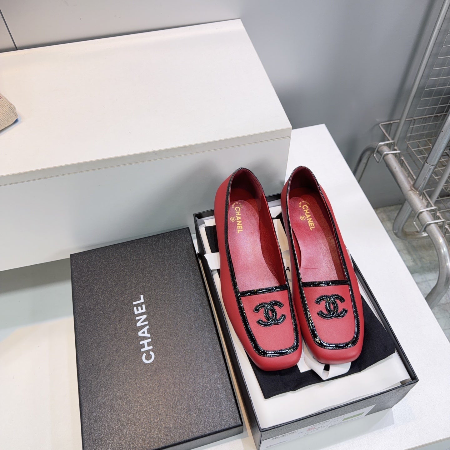 CHANEL 26S SQUARE TOE FLATS IN RED CALFSKIN WITH BLACK PATENT