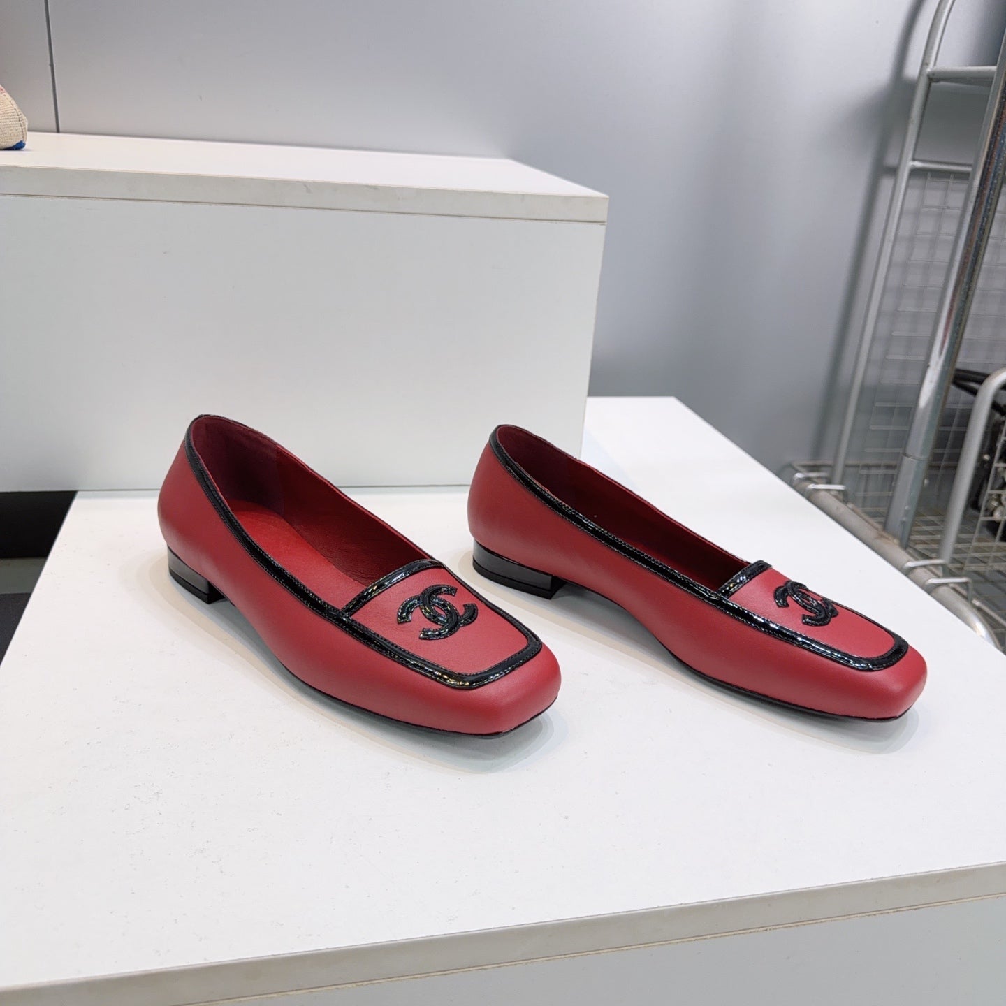 CHANEL 26S SQUARE TOE FLATS IN RED CALFSKIN WITH BLACK PATENT