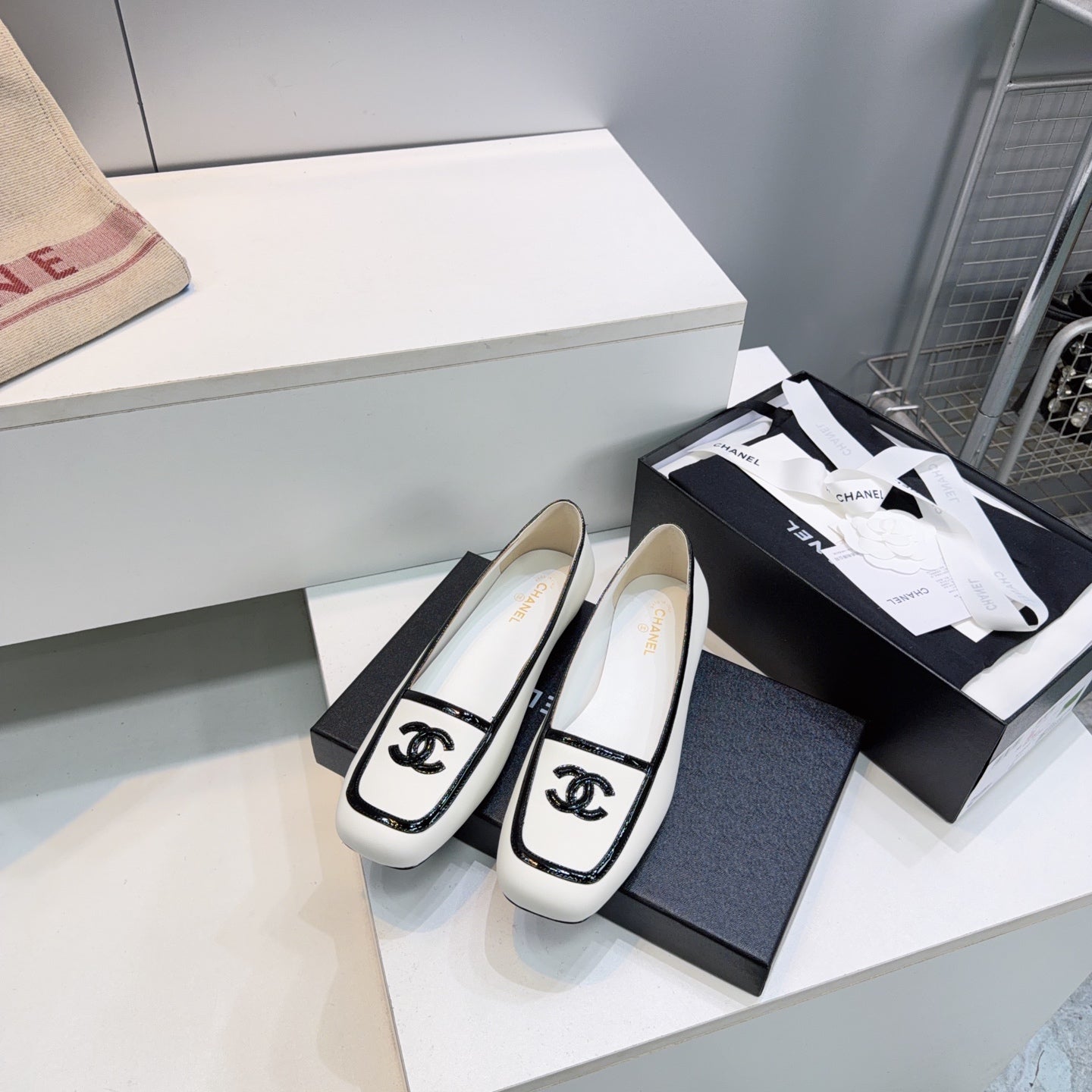 CHANEL 26S SQUARE TOE FLATS IN WHITE CALFSKIN WITH BLACK PATENT