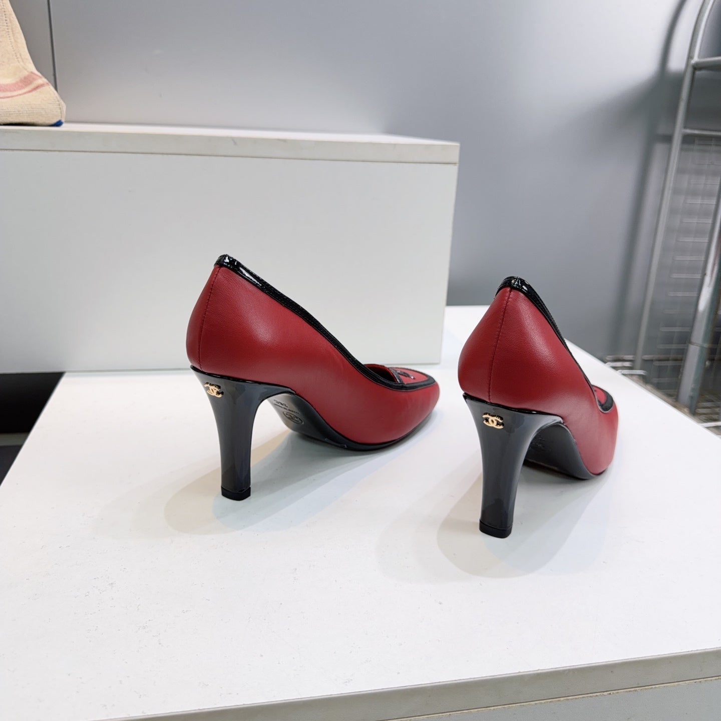CHANEL 26S HIGH HEEL PUMPS 85 MM IN RED CALFSKIN WITH BLACK PATENT