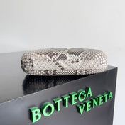KNOT CHAIN CLUTCH 20.5 IN SNAKE PATTERN CALFSKIN