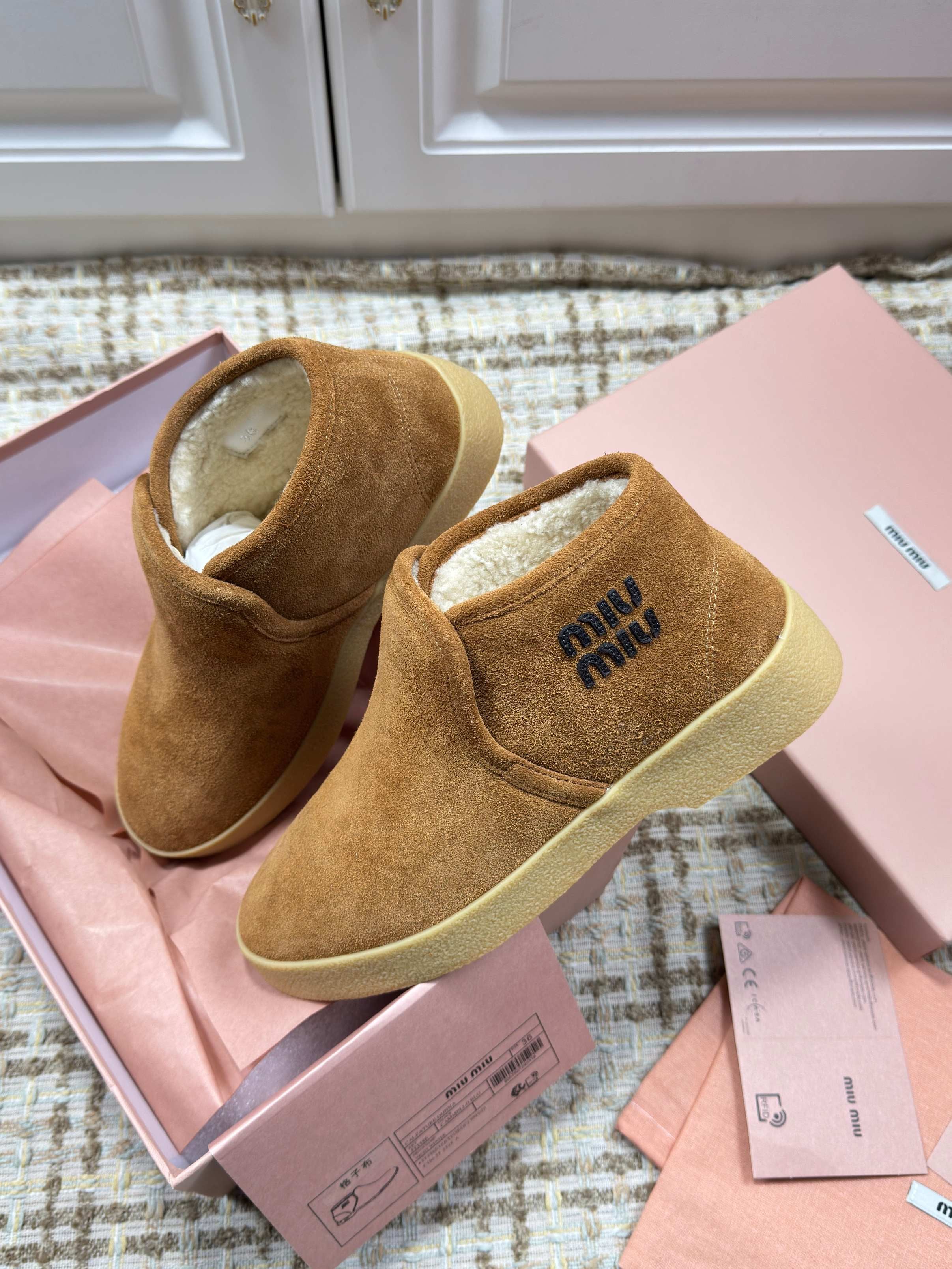 MIUMIU 26S SLIP-ON BOOTIES IN CAMEL BROWN SUEDE WITH SHEARLING