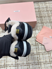 MIUMIU 26S SNEAKERS IN BLACK SUEDE AND SHEARLING