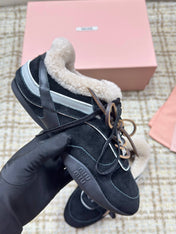 MIUMIU 26S SNEAKERS IN BLACK SUEDE AND SHEARLING