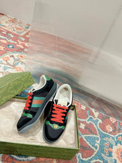 GUCCI 26S SCREENER SNEAKER IN BLACK SUEDE AND GREEN LEATHER