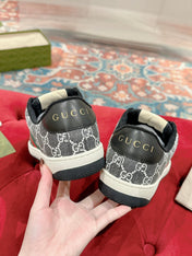 GUCCI 26S SCREENER SNEAKER IN BLACK AND WHITE GG CANVAS