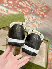 GUCCI 26S SCREENER SNEAKER IN BLACK AND WHITE LEATHER 