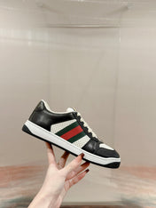 GUCCI 26S SCREENER SNEAKER IN BLACK AND WHITE LEATHER 