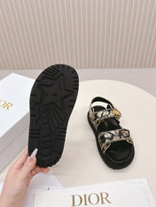 DIOR BACK-STRAP SANDALS 25S IN BLACK AND GOLD CALFSKIN WITH BUTTERFLY MOTIF