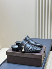 ALAIA 26S PLEATED MULES IN BLACK LAMBSKIN