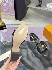 LV 26S BLOCK HEEL MULE SANDALS IN BLACK EMBOSSED CALFSKIN GOLD HARDWARE