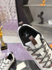 LV 26S RUSH XPLORER SNEAKER IN WHITE BLACK CALFSKIN AND SUEDE