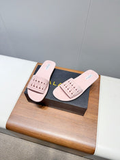 ALAIA FLAT SANDALS WITH PERFORATED STRAPS 25S IN LIGHT PINK SUEDE