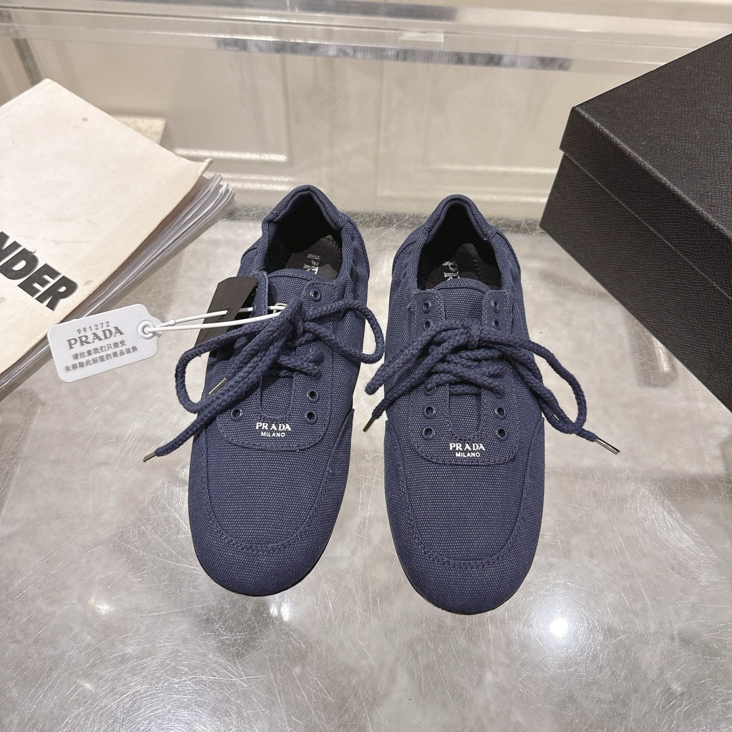 PRADA 26S COLLAPSE SNEAKERS IN BLUE CANVAS