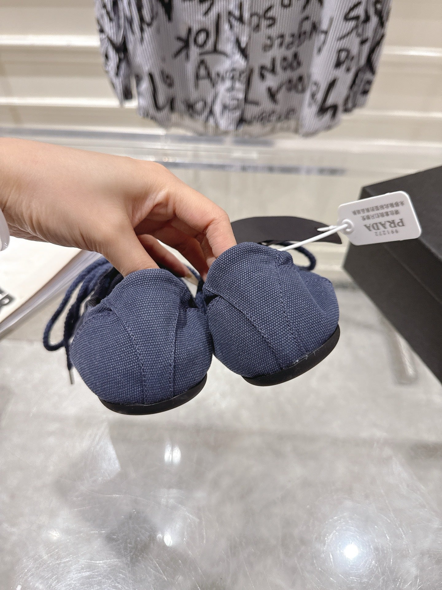 PRADA 26S COLLAPSE SNEAKERS IN BLUE CANVAS