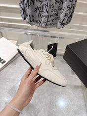 PRADA 26S COLLAPSE SNEAKERS IN WHITE CANVAS