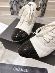 CHANEL 26S HIGH HEEL ANKLE BOOTS 70 MM IN WHITE LAMBSKIN AND BLACK PATENT CALFSKIN