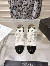 CHANEL 26S HIGH HEEL ANKLE BOOTS 70 MM IN WHITE LAMBSKIN AND BLACK PATENT CALFSKIN