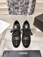 CHANEL 26S HIGH HEEL ANKLE BOOTS 70 MM IN BLACK LAMBSKIN AND PATENT CALFSKIN