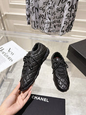 CHANEL 26S LACE UP SNEAKERS IN BLACK LAMBSKIN DIAMOND QUILTING