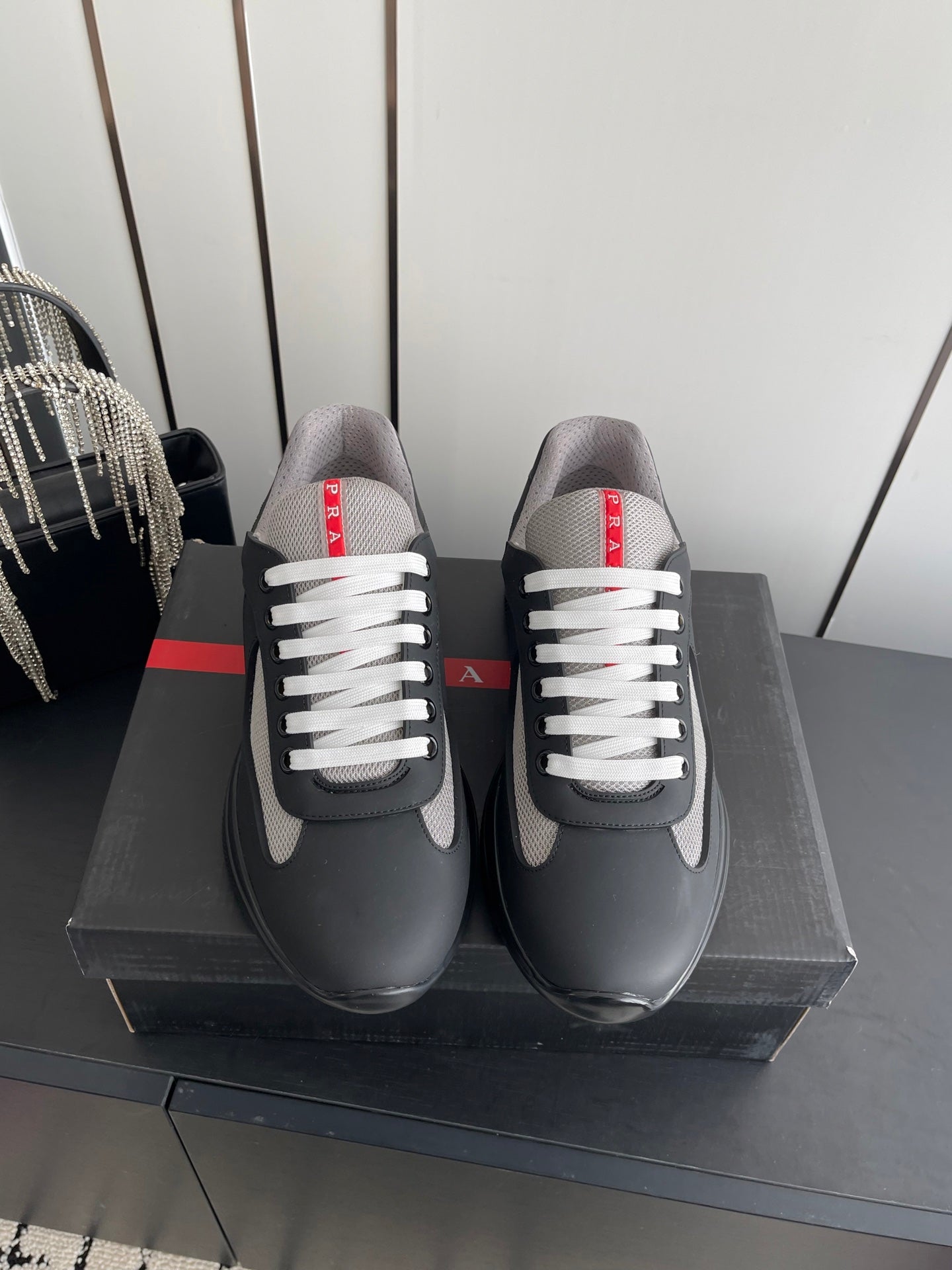 PRADA 26S AMERICA CUP SNEAKERS IN BLACK SOFT RUBBER AND BIKE FABRIC