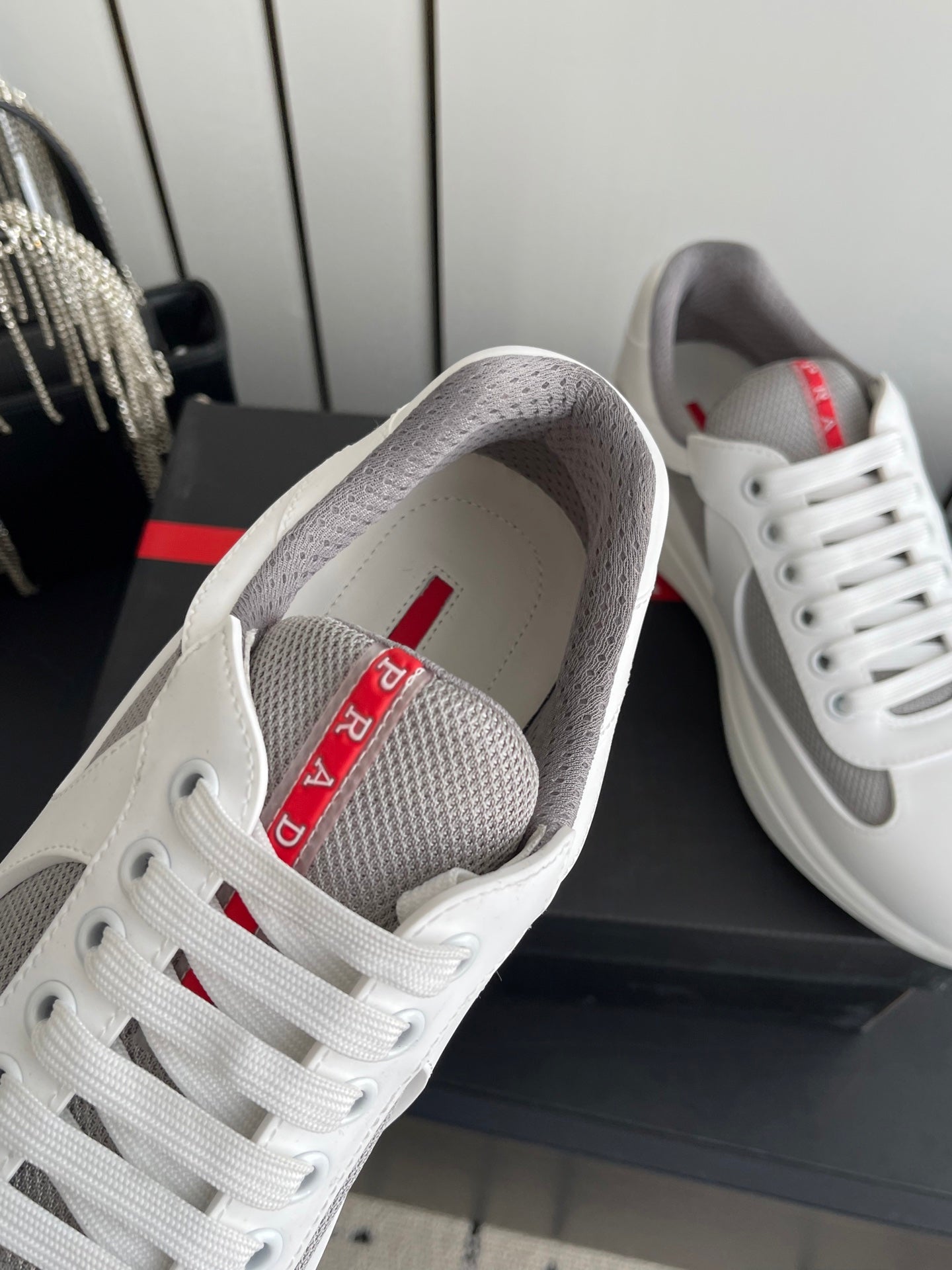 PRADA 26S AMERICA CUP SNEAKERS IN WHITE SOFT RUBBER AND BIKE FABRIC