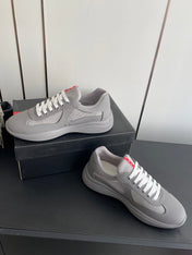 PRADA 26S AMERICA CUP SNEAKERS IN COOL GRAY SOFT RUBBER AND BIKE FABRIC