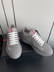 PRADA 26S AMERICA CUP SNEAKERS IN COOL GRAY SOFT RUBBER AND BIKE FABRIC