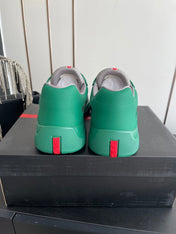 PRADA 26S AMERICA CUP SNEAKERS IN TEAL GREEN SOFT RUBBER AND BIKE FABRIC