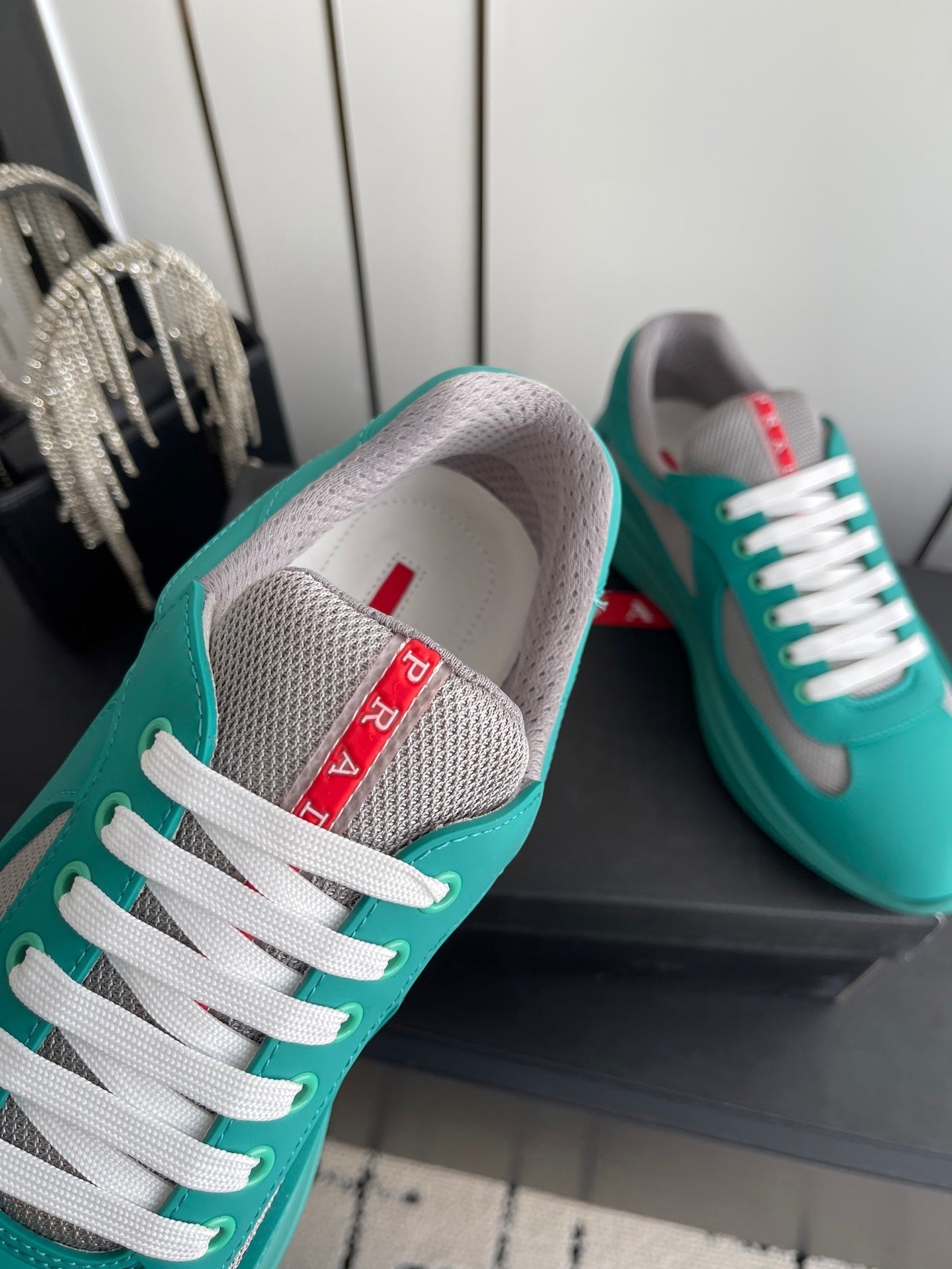 PRADA 26S AMERICA CUP SNEAKERS IN TEAL BLUE SOFT RUBBER AND BIKE FABRIC