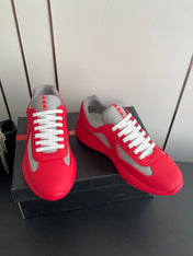 PRADA 26S AMERICA CUP SNEAKERS IN RED SOFT RUBBER AND BIKE FABRIC
