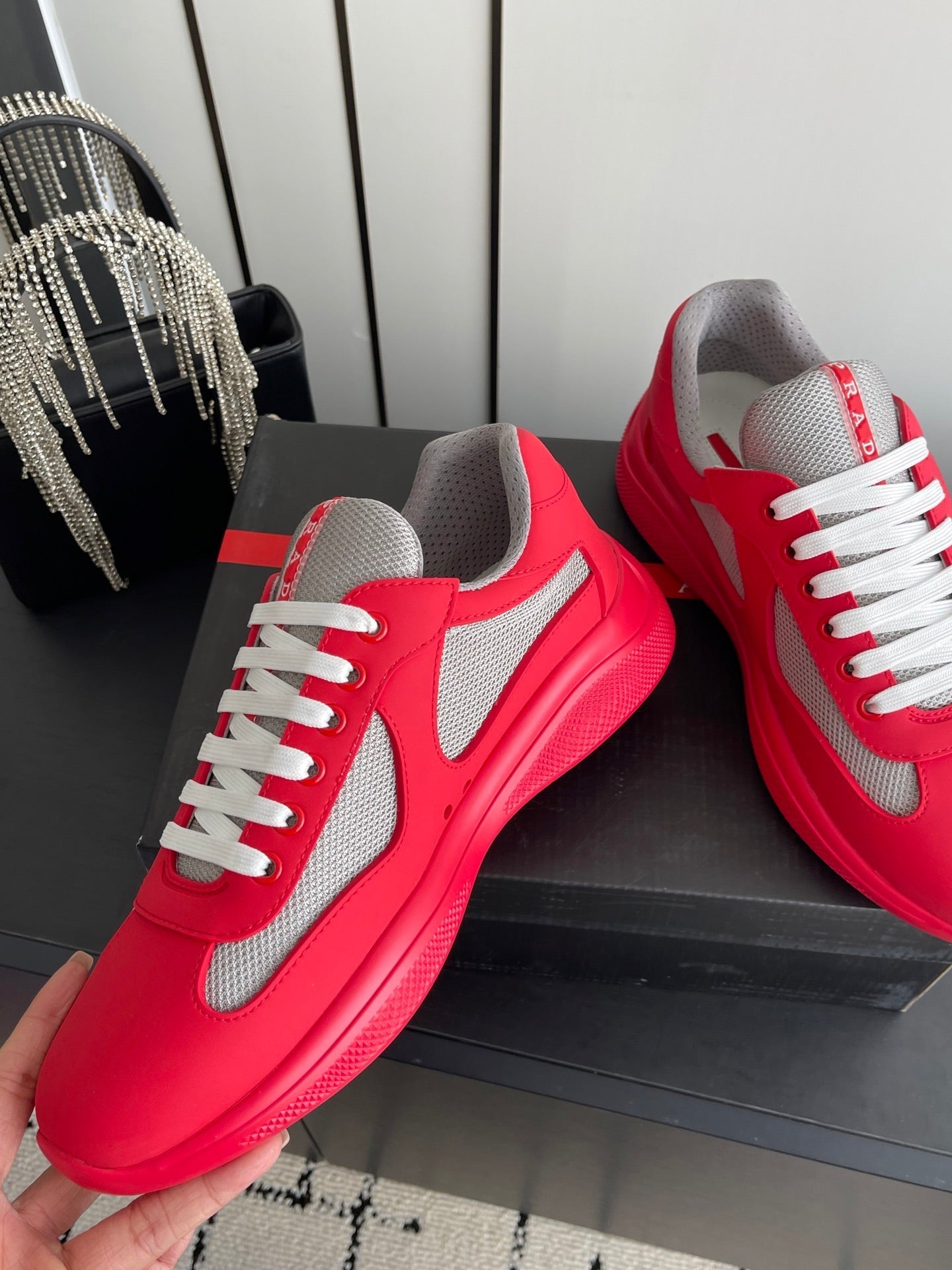 PRADA 26S AMERICA CUP SNEAKERS IN RED SOFT RUBBER AND BIKE FABRIC