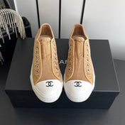 CHANEL 26S LOW TOP BEIGE IN NAVY BLUE CANVAS