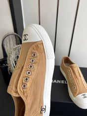 CHANEL 26S LOW TOP BEIGE IN NAVY BLUE CANVAS