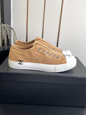 CHANEL 26S LOW TOP BEIGE IN NAVY BLUE CANVAS