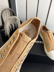 CHANEL 26S LOW TOP BEIGE IN NAVY BLUE CANVAS