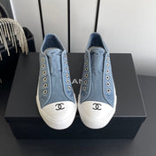 CHANEL 26S LOW TOP SNEAKERS IN NAVY BLUE CANVAS