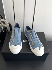 CHANEL 26S LOW TOP SNEAKERS IN NAVY BLUE CANVAS