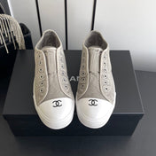 CHANEL 26S LOW TOP SNEAKERS IN GREY CANVAS