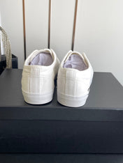 CHANEL 26S LOW TOP SNEAKERS IN WHITE CANVAS