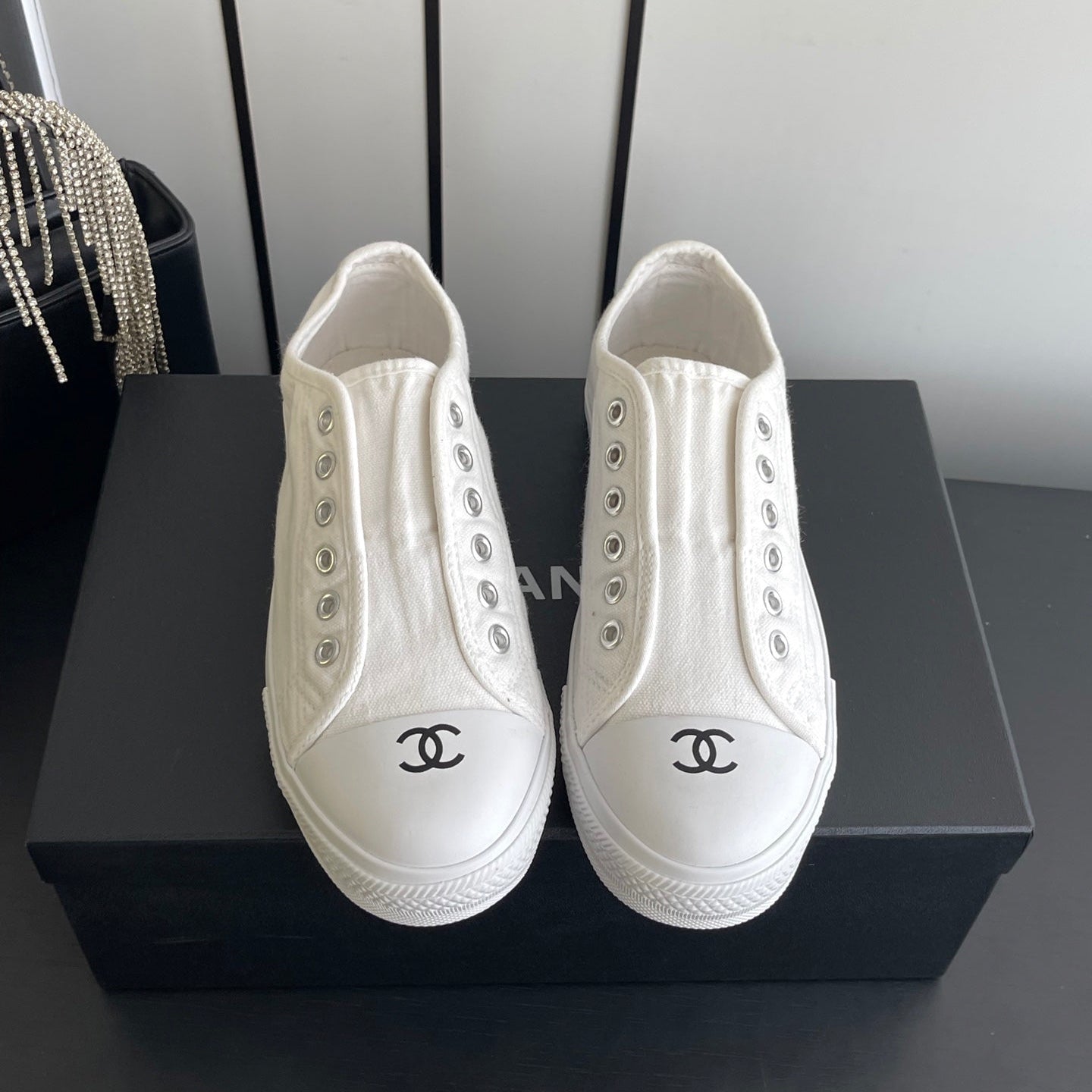 CHANEL 26S LOW TOP SNEAKERS IN WHITE CANVAS