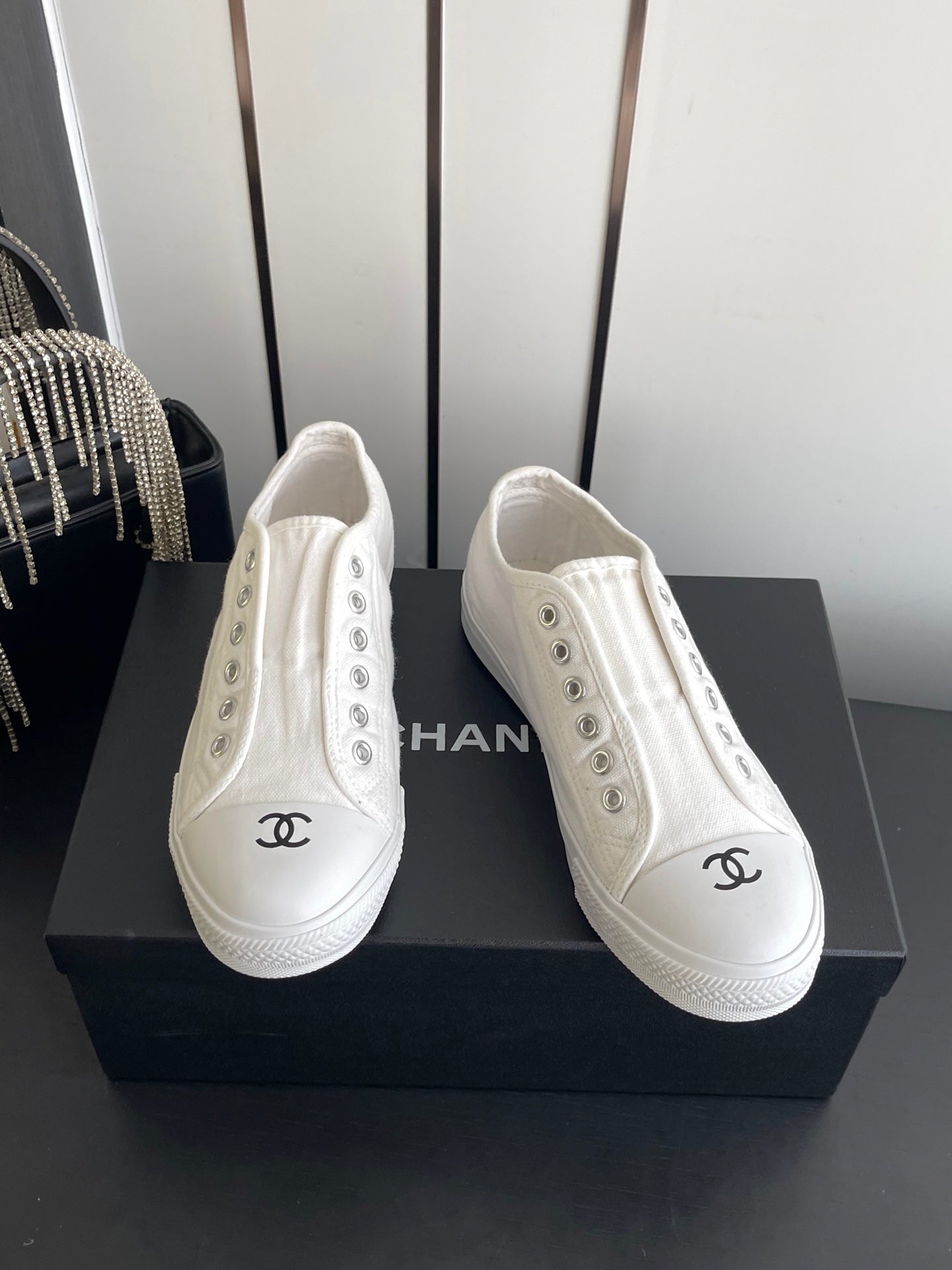 CHANEL 26S LOW TOP SNEAKERS IN WHITE CANVAS