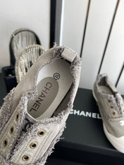 CHANEL 26S LOW TOP SNEAKERS IN GREY FRAYED CANVAS