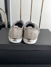 CHANEL 26S LOW TOP SNEAKERS IN GREY FRAYED CANVAS